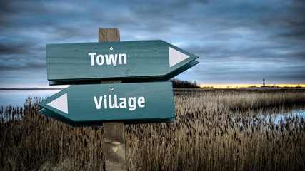 Street Sign Town versus Village