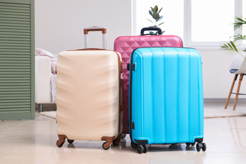 Packed suitcases in room