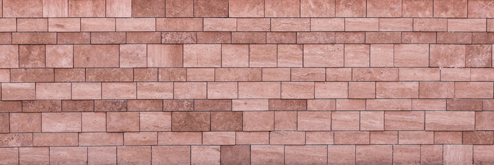 brown stony wall of decorative stone block