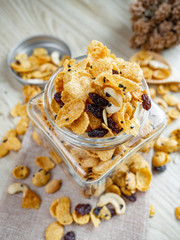 Cornflakes caramel in glass bottle.