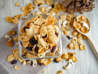 Cornflakes caramel in glass bottle.