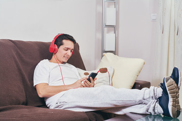 young boy enjoys listening to music