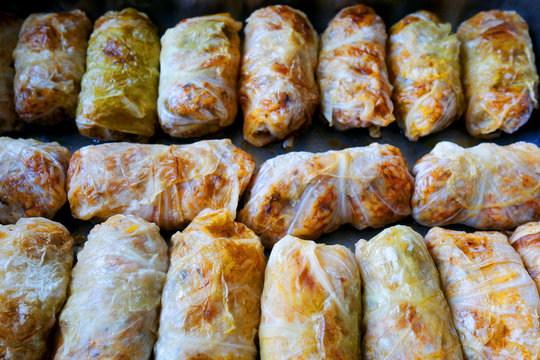 Home made food. Prepared for baking sarmi. Traditional meal with rice-stuffed cabbage leaves for Christmas Eve.