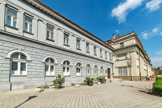 Novi Sad, Serbia - April 06, 2019: Serbian Army Building in Novi Sad. Old army Cannons used by Serbian military in the World war one (WWI) in front of the Serbian Army Building.