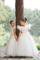 happy beautiful girls with white wedding dresses