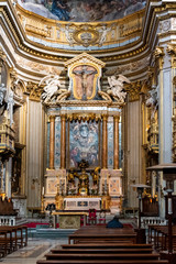 Fototapeta na wymiar Colorful altar of italian catholic church