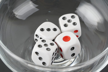 a dice in a glass
