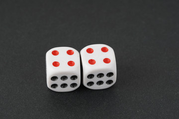 a dice over black surface
