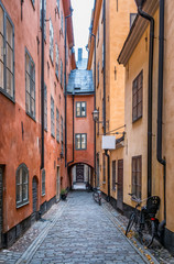 Stockholm old town alley, Sweden. Gamlastan: Stockholm old town. Colourful narrow street. Sweden