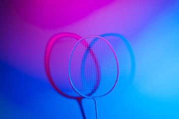 Badminton racket in vibrant bold gradient holographic neon colors