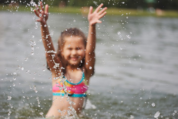 Fototapeta premium cute happy little girls in sumer lake