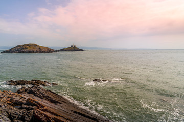 Coastal picture of the sea and a lighthouse, Mumbles, Swansea