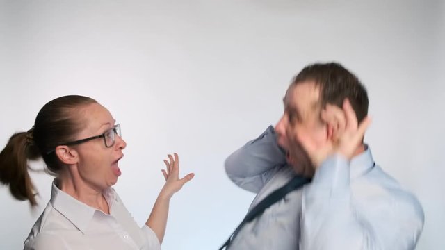 Businessmen sneer at each other building funny grimaces. The relationship between a man and a woman.