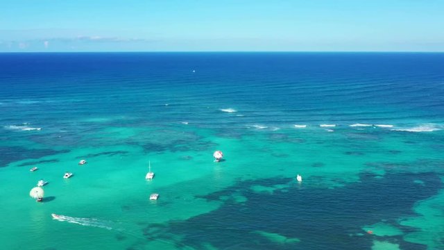 Aerial view with caribbean sea with boats, tropical destination