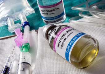 Vial with pentobarbital used for euthanasia and lethal inyecion in a hospital, conceptual image