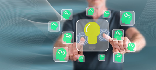 Fototapeta premium Man touching a teamwork idea concept