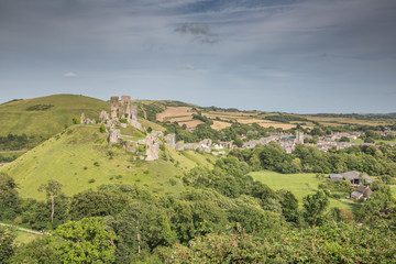 A summer view over Corfe Castle, a village and civil parish in the English county of Dorset