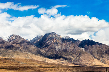 Xinjiang, China: Himalaya’s mountains on the Pamir Plateau along Karakorum Highway. Connecting Kashgar to the Pakistan Border across Pamir, this road has some of the best views of China