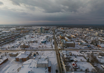 Yugorsk city. Aerial. Winter, snow, cloudy. Khanty Mansiysk Autonomous Okrug (HMAO), Russia.