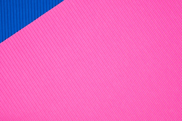 Blue and pink corrugated paper texture, use for background. vivid colour with empty space for add text or object.