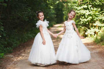 happy beautiful girls with white wedding dresses