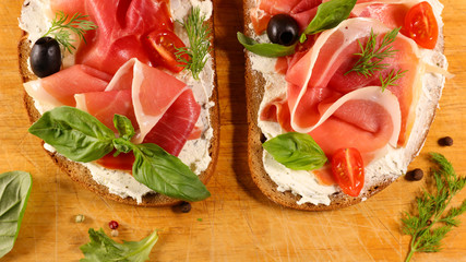 bread with cheese and prosciutto ham