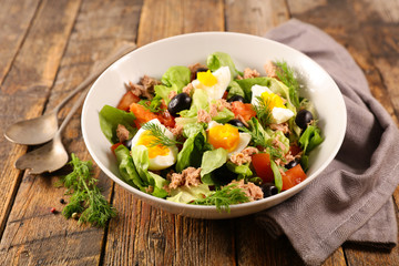 mixed vegetable salad with egg, tuna and tomato