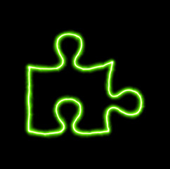 green neon symbol puzzle piece