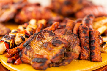 close up of mix grill served on a plate, selective focus