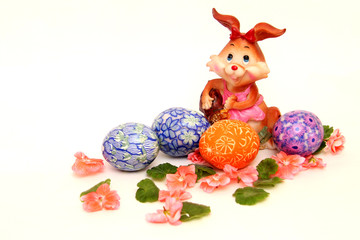 Fototapeta na wymiar Easter bunny and painted eggs - Easter symbol