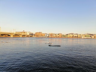 Fototapeta premium view of the river and the waterfront at sunset 