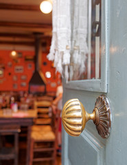 Athens Greece, welcome in an old traditional tavern, brurred details