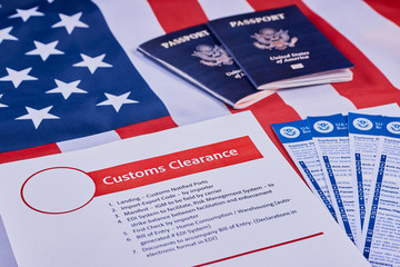 Page with the rules of customs clearance next to forms of the customs declaration, American...