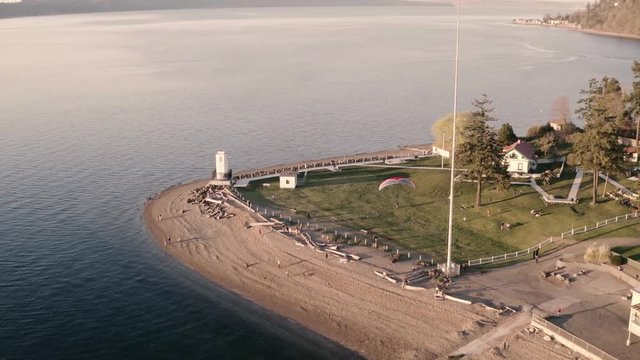 Drone footage of powered paragliding, paramotor flying by Browns Point in Tacoma, Washington.
