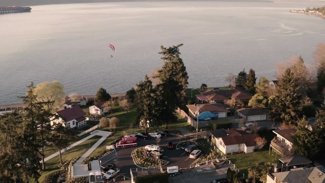 Drone footage of powered paragliding, paramotor flying by Browns Point in Tacoma, Washington.