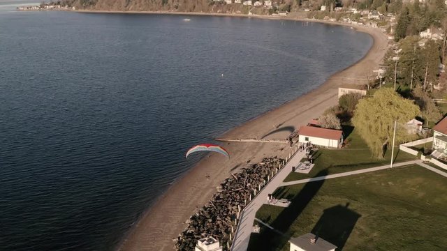 Drone footage of powered paragliding, paramotor flying by Browns Point in Tacoma, Washington.