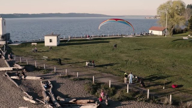 Drone footage of powered paragliding, paramotor flying by Browns Point in Tacoma, Washington.