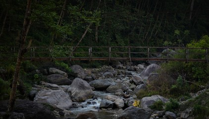 Old bridge and serene stream