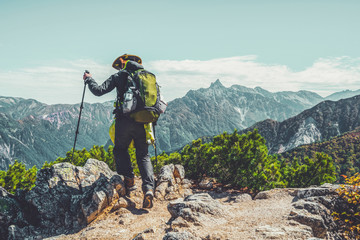 Epic adventure of hiker do trekking activity in mountain of Northern Japan Alps, Nagano, Japan,...