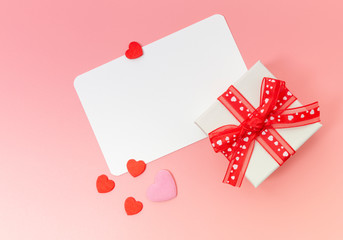 Mother's Day and the day to give to loved ones, white gift box and red ribbon, stationery