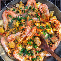 Cooking a paella.
