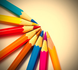 Naklejka premium colored pencils on white