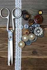 vintage buttons, lace, and a dressmaker scissors