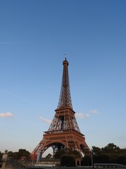 Fototapeta na wymiar Eiffel tower. Paris, France. The famous historical landmark on the Seine. Romantic, tourist, symbol of the greatness of architecture.