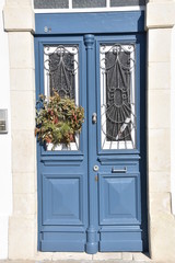 Fototapeta na wymiar Blue Mediterranean Double Entry Doors, Cyprus