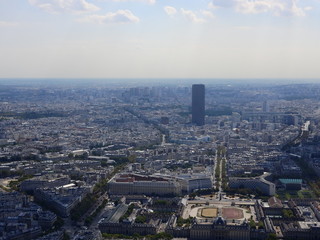 Champ de Mars view from top of eiffel tower looking down see the entire city as a beautiful classic architecture. A romantic place for lovers and family to visit.