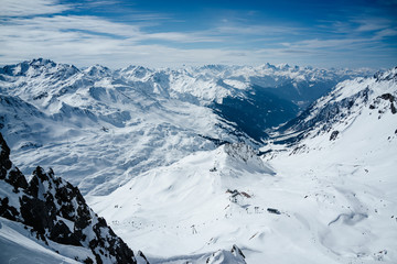 Panoramic view of the snowy alpine mountains. Lech, Austria