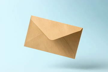 The envelope falls to the ground on a colored background.