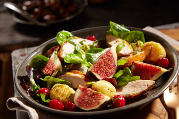 Wild salad with chestnuts, pheasant and figs