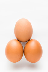 Balance of three chicken eggs